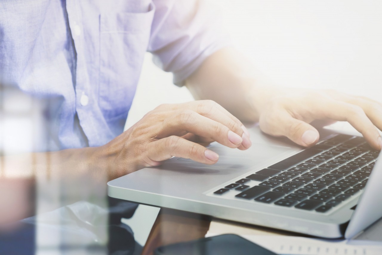 man-s-hands-typing-laptop-keyboard.jpg